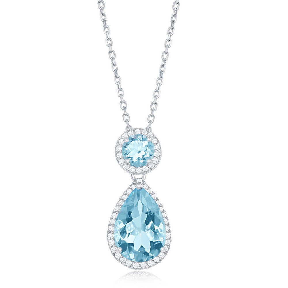Elegant blue topaz sterling silver necklace featuring a teardrop and round gemstone design