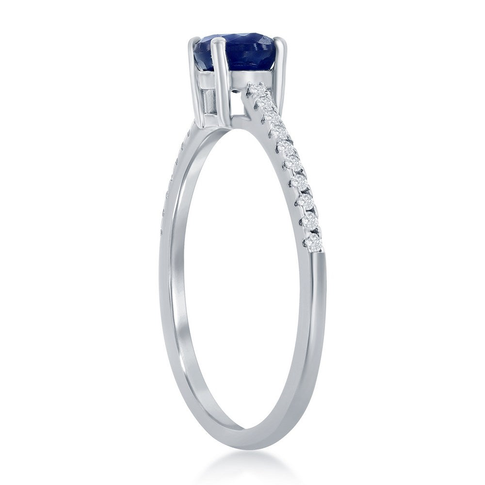 Classic Of New York sterling silver sapphire ring with a sparkling band and a deep blue sapphire centerpiece