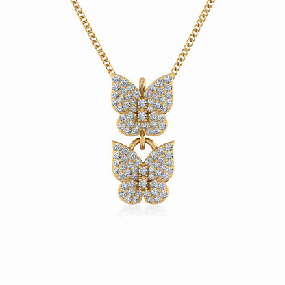 10K yellow gold butterfly pendant adorned with sparkling gemstones, perfect for elegant jewelry lovers