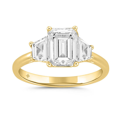 Elegant certified emerald cut diamond ring in yellow gold featuring three stunning diamonds