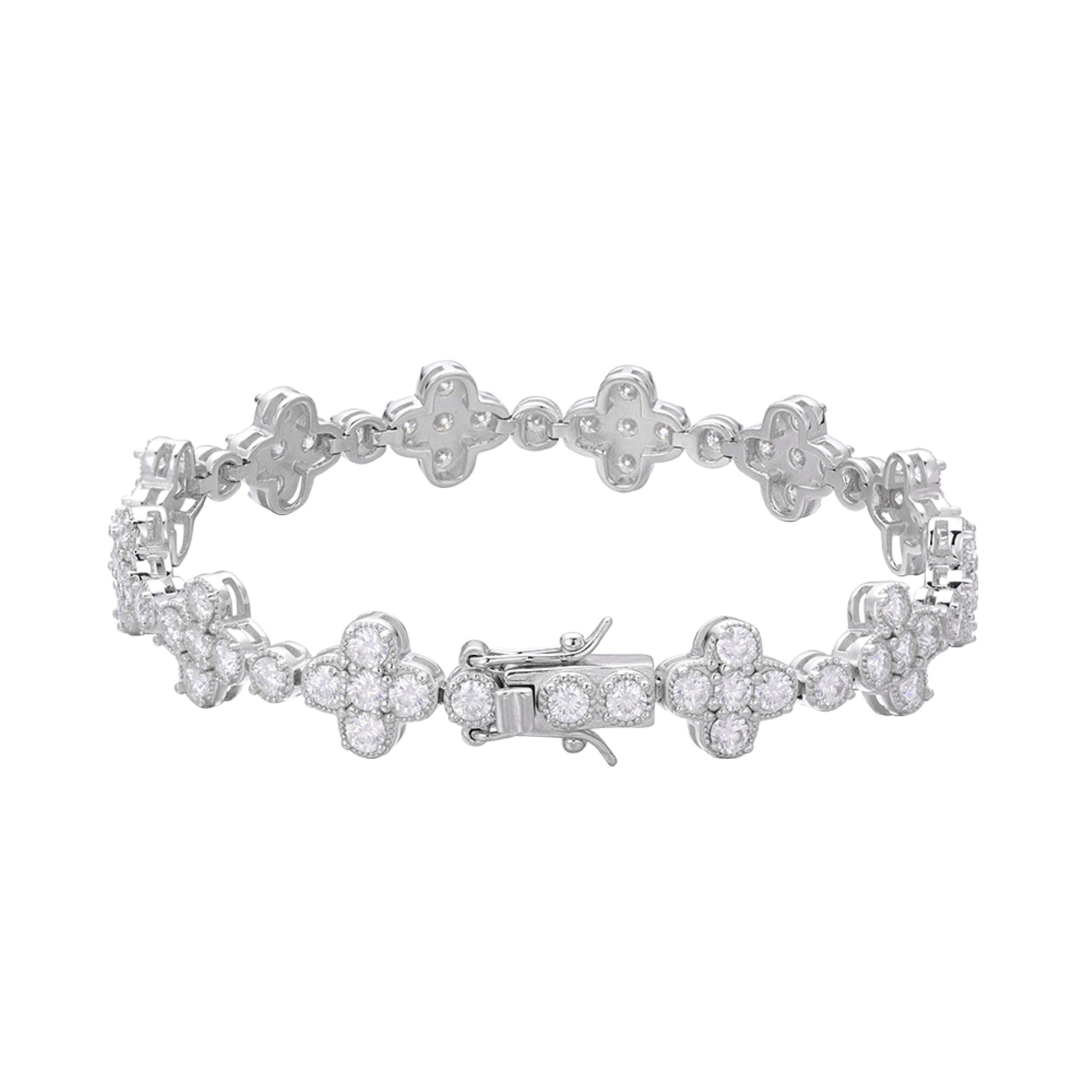 Elegant sterling silver moissanite bracelet featuring floral designs and sparkling stones