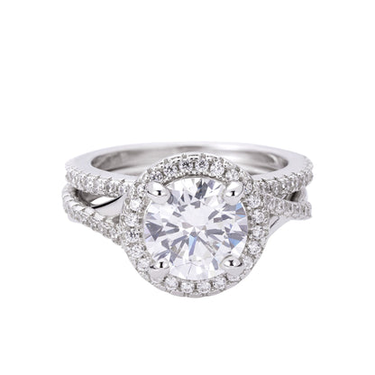 Stunning moissanite designer women's ring with a round center stone and halo of smaller stones