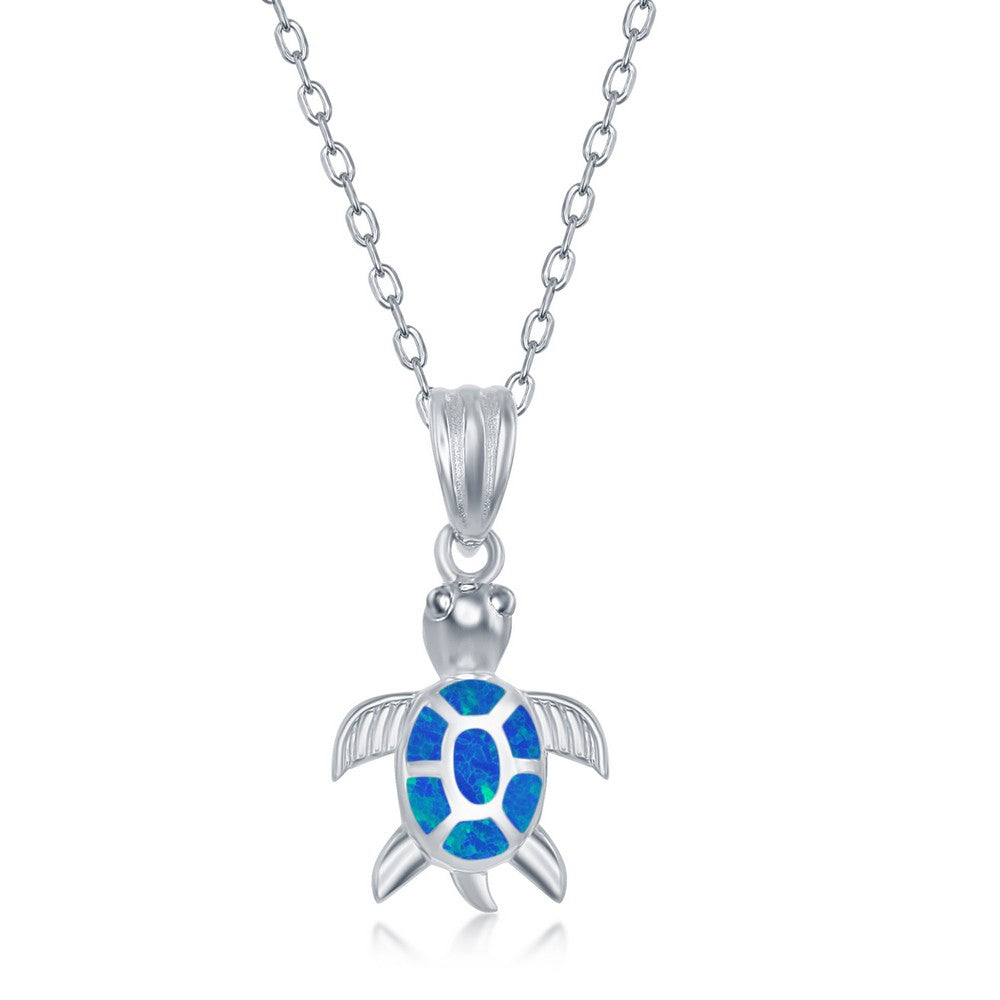 Classic Of New York sterling silver turtle jewelry set featuring a turtle pendant with blue opal inlay