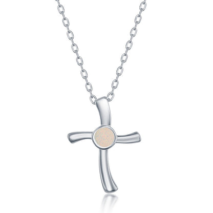 Classic Of New York sterling silver cross jewelry set featuring a delicate necklace with a polished cross