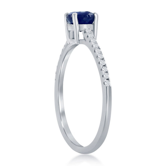 Classic Of New York sterling silver sapphire ring with a sparkling band and a deep blue sapphire centerpiece